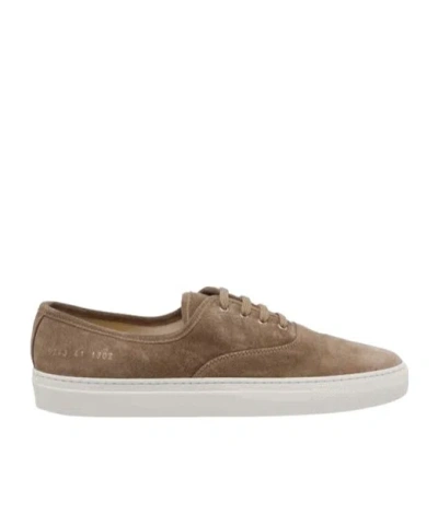 Common Projects Four Hole Laced Suede Sneakers In Brown