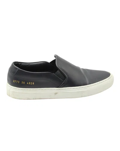 COMMON PROJECTS SLIP ON SNEAKERS IN BLACK LEATHER