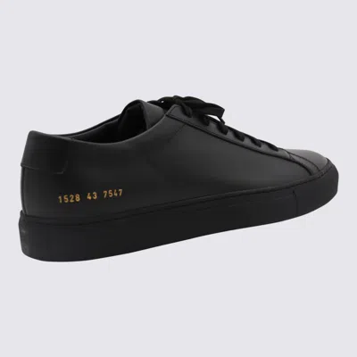 COMMON PROJECTS SNEAKERS BLACKS AND GREYS