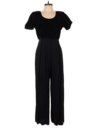 Pre-owned Compagnie Internationale Express Jumpsuit In Black