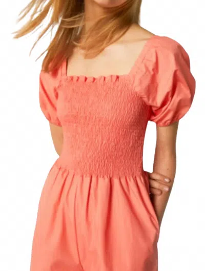 COMPAÑÍA FANTÁSTICA SMOCKED ROMPER IN CORAL
