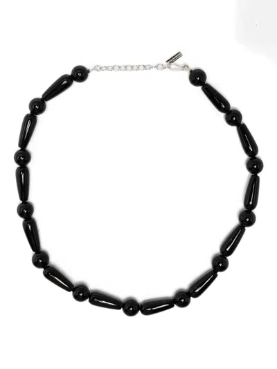 Completedworks The Depths Of Time Necklace In Black
