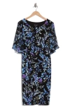 Connected Apparel Flutter Sleeve Faux Wrap Dress In Periwinkle