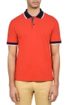 Construct Solid Pique Polo In Red