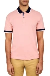 Construct Solid Pique Polo In Salmon