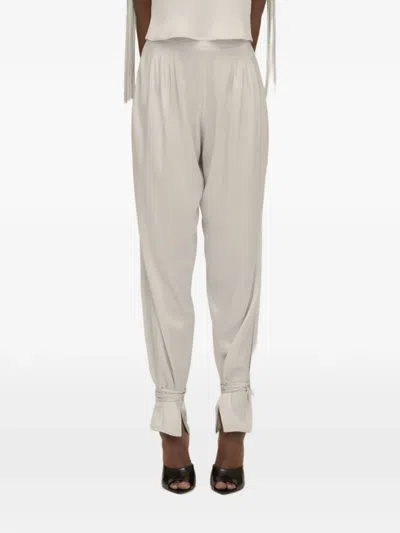 Contessa Mills Mane Pleated Tie-cuff Trousers In Neutral