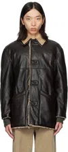 Coor Reversible Fake Shearling Coat In Black