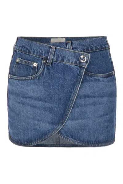 Coperni Curved Hem Wrap Denim Mini Skirt Skirt In Washed Blue