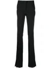 Coperni Flared Slim-cut Trousers In Black