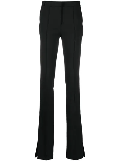 Coperni Flared Slim-cut Trousers In Black