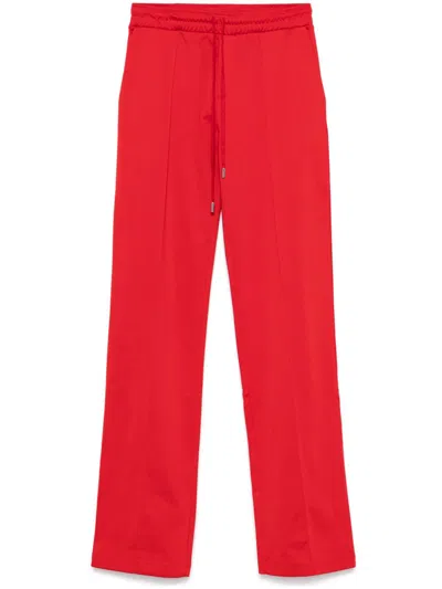 Coperni Flared Track Pants In Red