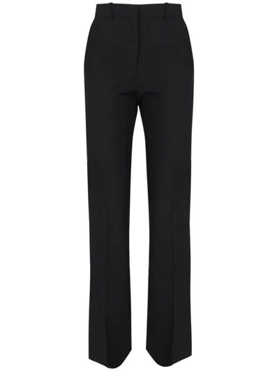 Coperni Logo-plaque Trousers In Black