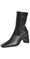 Coperni Low Bridge Stretch Boots Black In Black