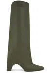 Coperni Green Rubber Bridge Tall Boots In Green