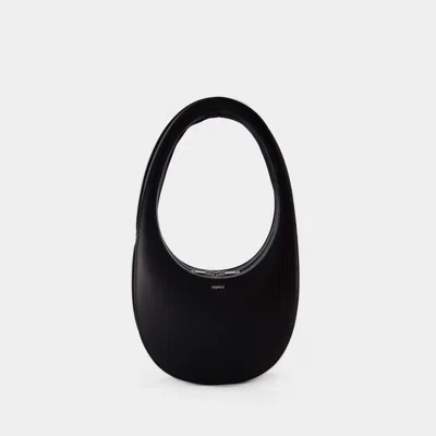 Coperni Curved Leather Tote Bag In Black