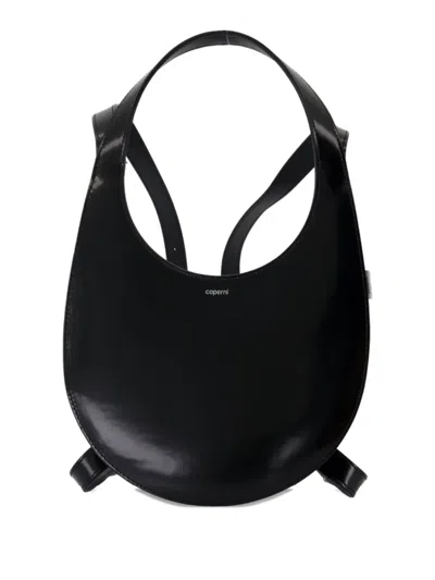 Coperni Swipe Oval-shaped Calfskin Backpack In Black