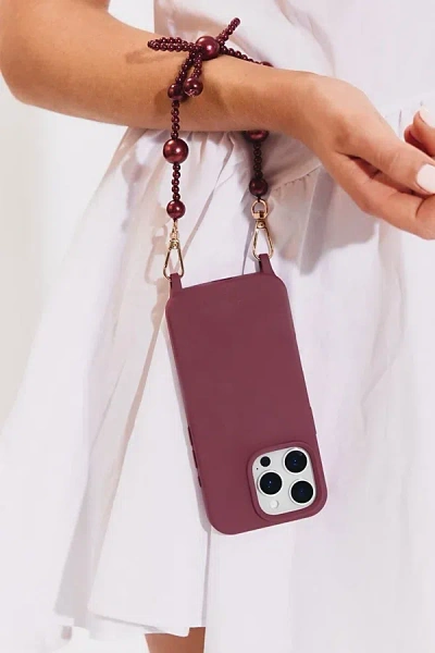 Cordée Cases Burgundy Bow Phone Wristlet In Burgundy At Urban Outfitters In Purple