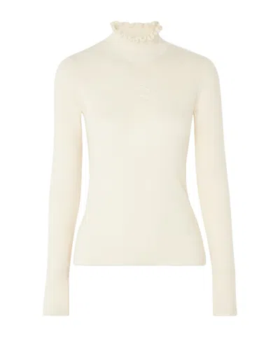 Cordova Ruffled Turtleneck Sweater In Pink