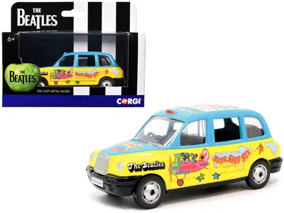 Corgi The Beatles London Taxi Rhd (right Hand Drive) "hello Goodbye" Blue And Yellow With Graphics Diecast