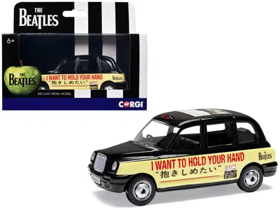 Corgi The Beatles London Taxi Rhd (right Hand Drive) "i Want To Hold Your Hand" Black And Cream With Graph