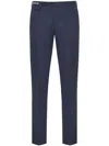 Corneliani Pressed-crease Wool Trousers In 蓝色