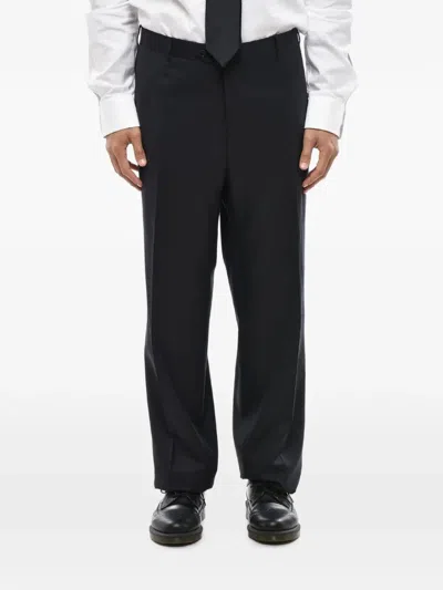 Corneliani Pressed-crease Trousers In Black