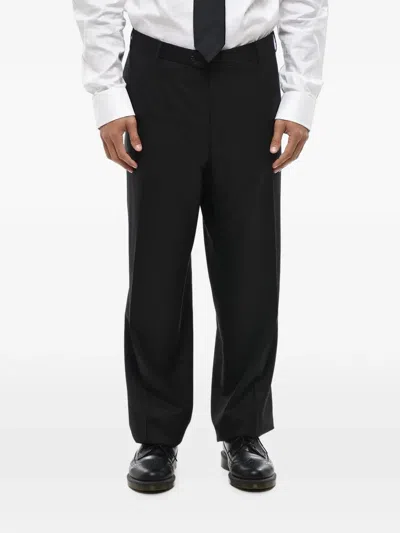 Corneliani Scalloped-hem Virgin Wool Trousers In Black