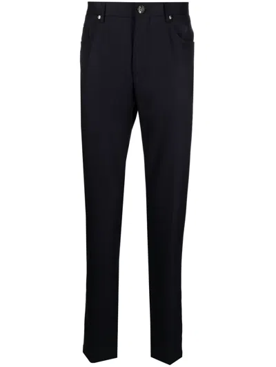 Corneliani Tapered Virgin Wool Trousers In Blue