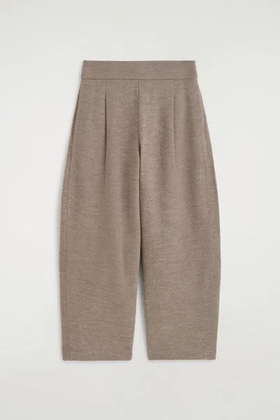Cos Boiled-wool Barrel-leg Trousers In Beige In Sand
