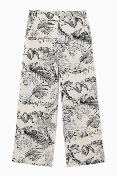 Cos Botanical-print Trousers In Black