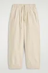 Cos Cotton Tapered Drawstring Trousers In Beige In Sand
