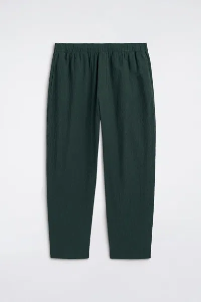 Cos Crinkled-cotton Relaxed-fit Tapered Pants In Green