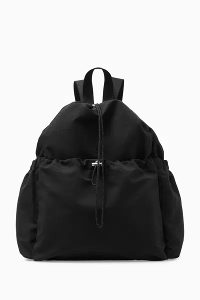 Cos Drawstring Backpack In Brown