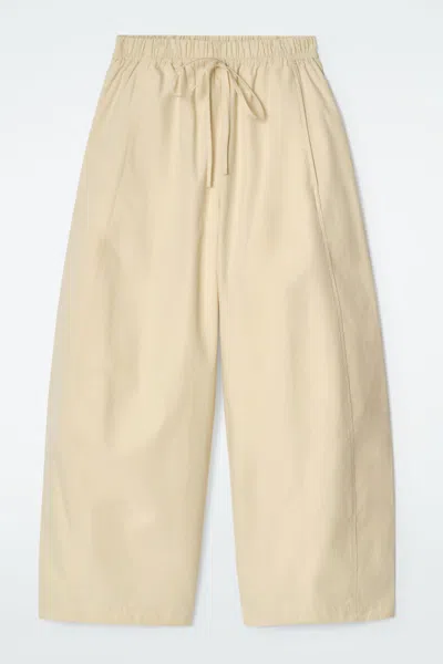 Cos Elasticated Barrel-leg Trousers In Beige