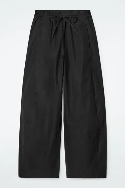 Cos Elasticated Barrel-leg Trousers In Black