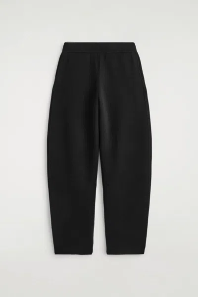 Cos Knitted Wool Barrel-leg Trousers In Black