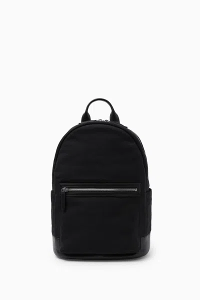Cos Leather-trimmed Canvas Backpack In Black