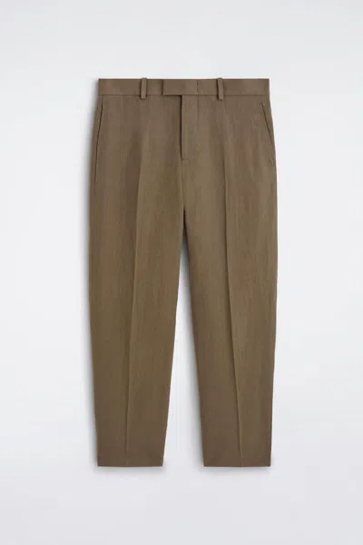 Cos Linen Relaxed-fit Tapered Trousers In Green