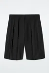 Cos Longline Pleated Linen Shorts In Black