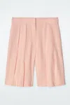 Cos Longline Pleated Linen Shorts In Orange