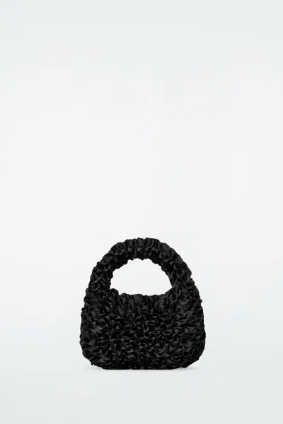 Cos Micro Dahlia Bag In Black