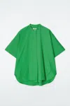 Cos Oversized Curved-hem Cotton Shirt In Vert