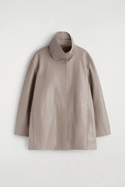Cos Oversized Leather Mock-neck Bomber Jacket In Sand