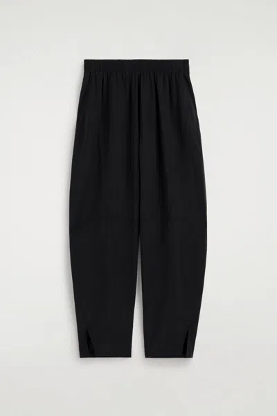 Cos Panelled Elasticated Barrel-leg Trousers In Black