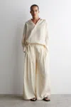 Cos Pleated Modal Wide-leg Trousers In Beige In Sand