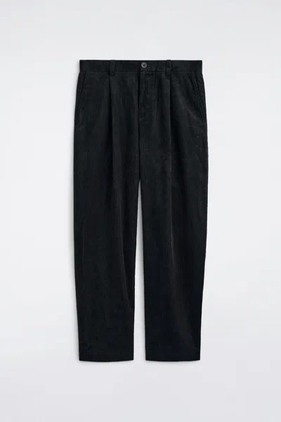 Cos Pleated Relaxed-fit Tapered Corduroy Pants In Black