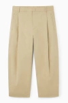 Cos Pleated Tapered Trousers In Beige