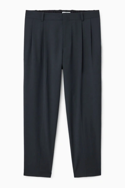 Cos Pleated Technical Wool Trousers In Blue