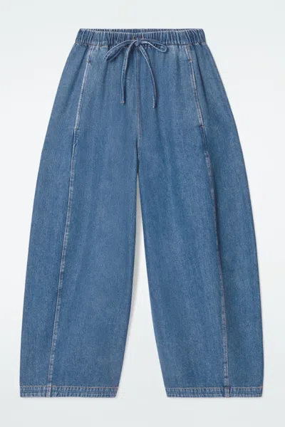 Cos Relaxed Barrel-leg Denim Drawstring Trousers In Blue