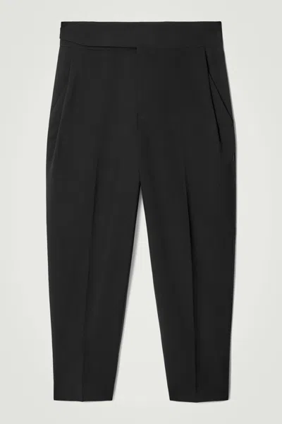 Cos Relaxed Belted Wool-hopsack Tapered Trousers In Black